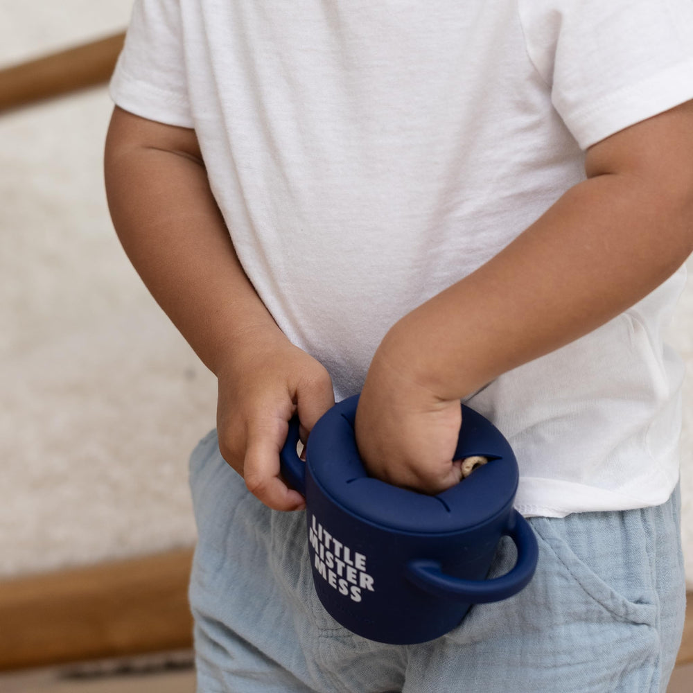 Bella Tunno soft silicone flaps enable gentle, spill-controlled snacking for curious toddlers.