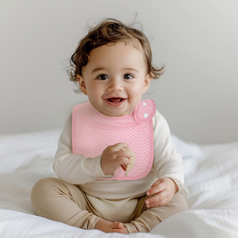 Benoxine baby bibs on baby highlighting soft touch and comfortable daily wear.