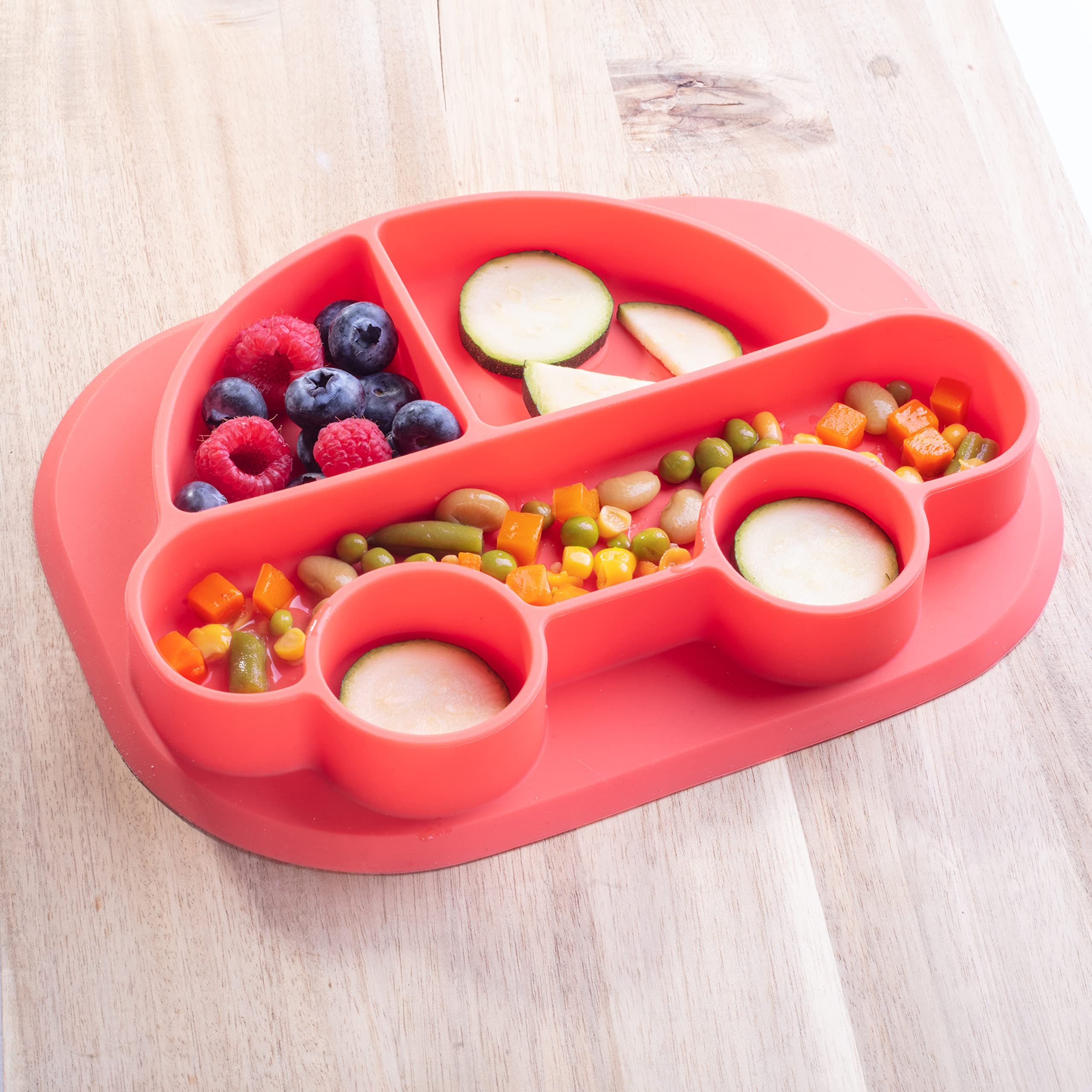 Bentology train-design silicone plate with dividers keeps portions organized during meals.