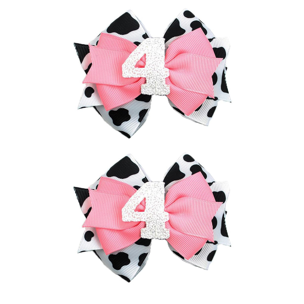 BESALECK cow-print bow clip adds party-ready charm to her hairstyle.