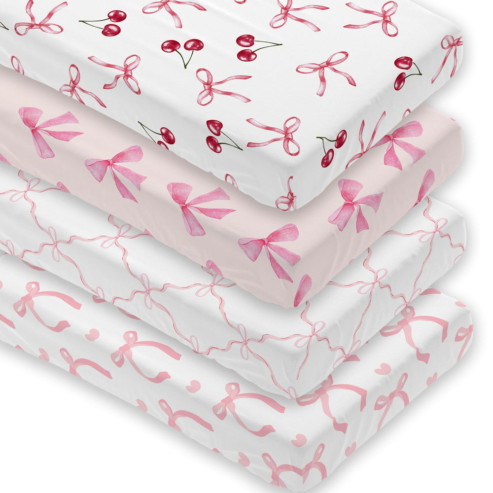 Besaomeom 4-pack pink bow crib sheet with secure fit for standard cribs.
