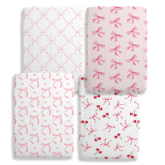 Besaomeom pink bow prints crib sheet set adds playful charm to nursery.