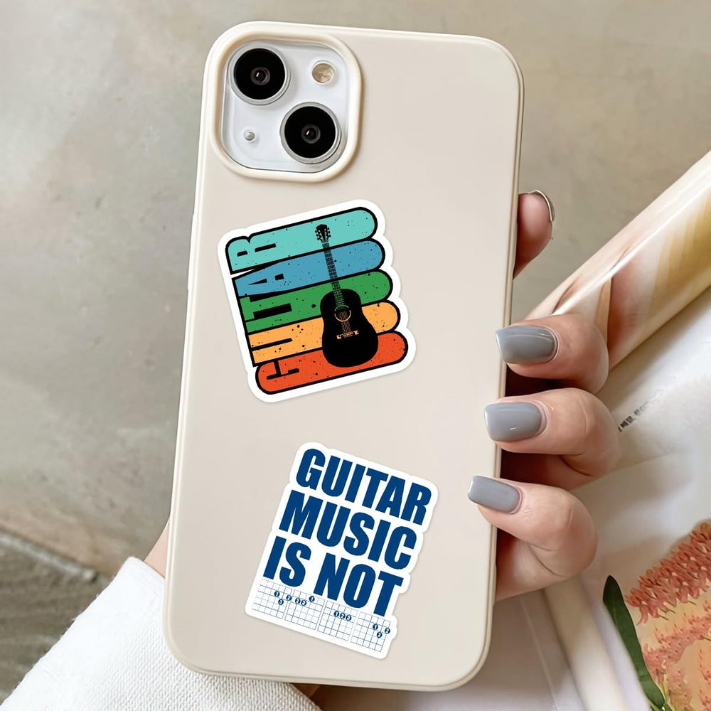 BETANAS guitar stickers on notebook page, flexible sizes for easy decorating.