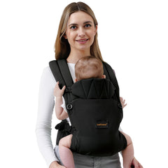 BethBear baby carrier front-worn on a newborn for close bonding and comfortable skin-friendly carry.