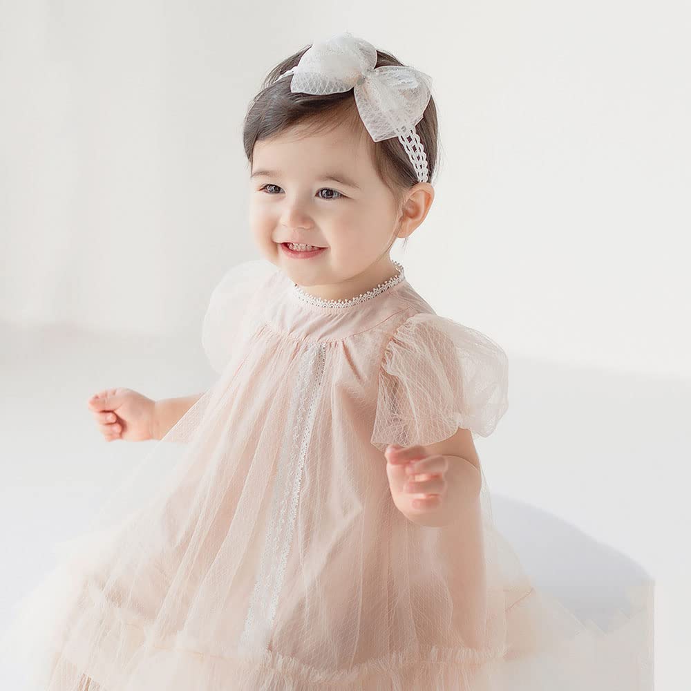 Bethynas birthday photos headband on baby shows cute styling for photos