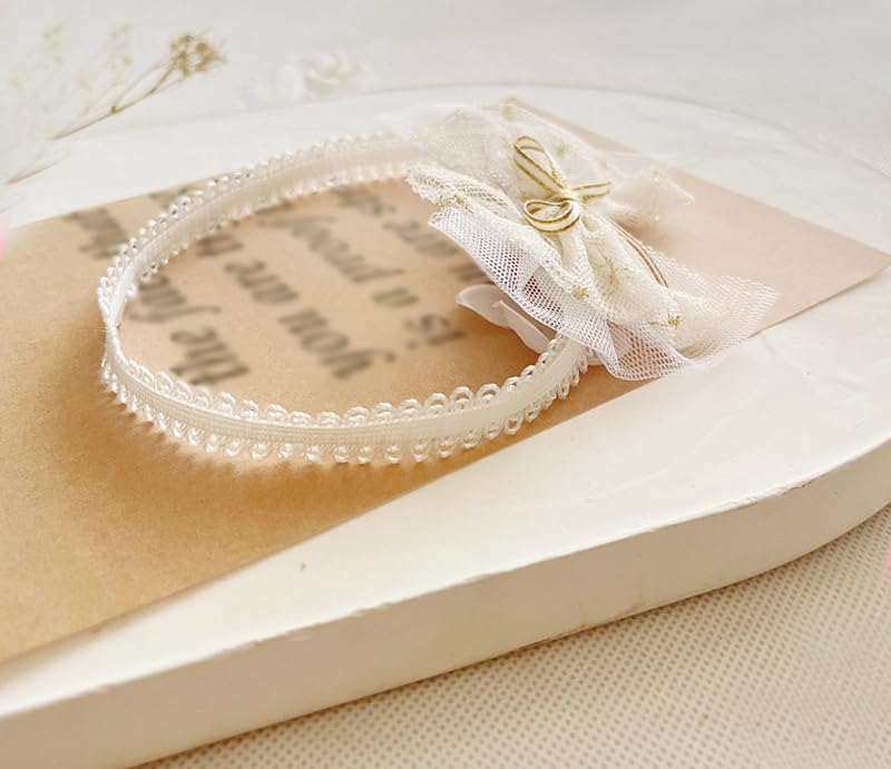 Bethynas newborn photo session headband showcases lace floral detail