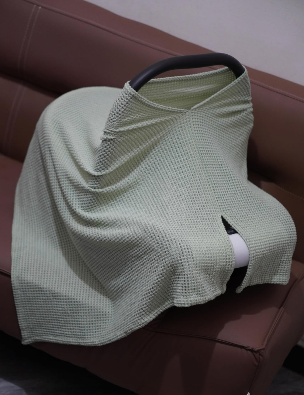 BEWDIO Green Nursing Cover doubles as a soft baby blanket during naps.