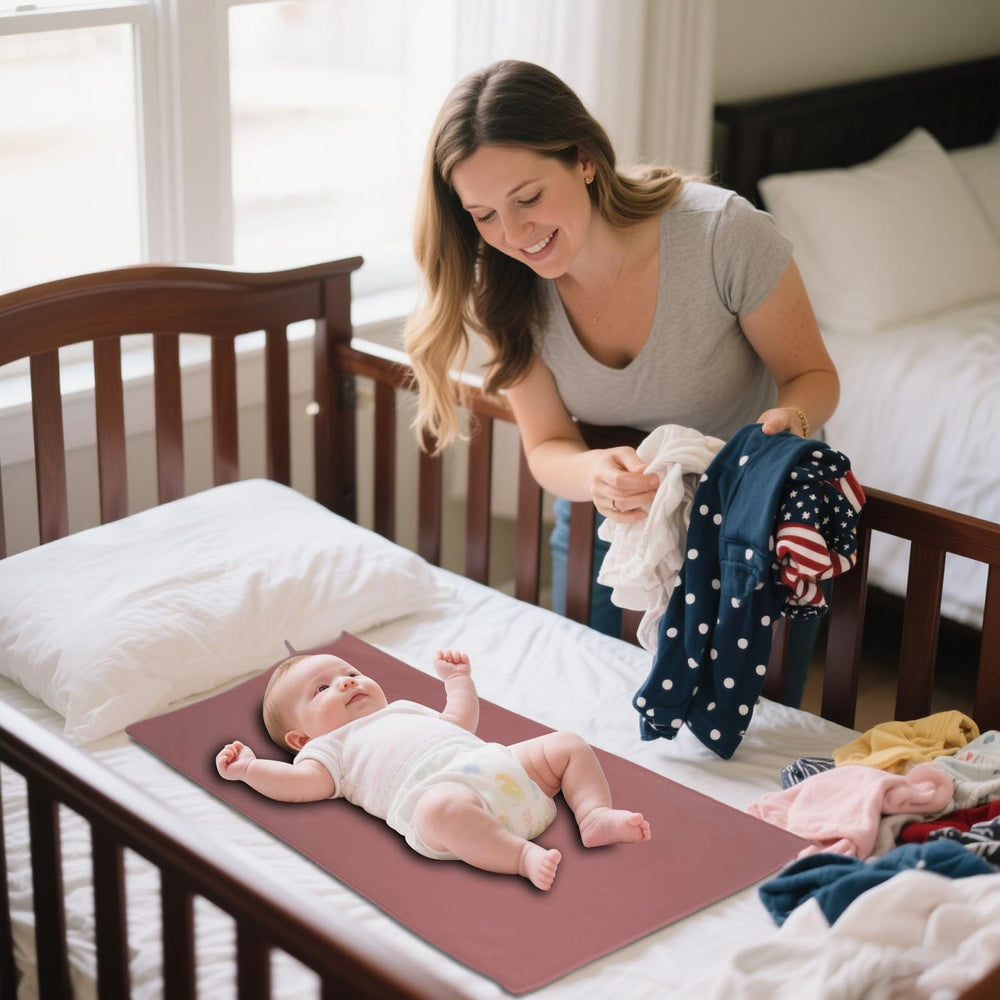 BEWDIO waterproof-durable-surface protects clothing during diaper changes.