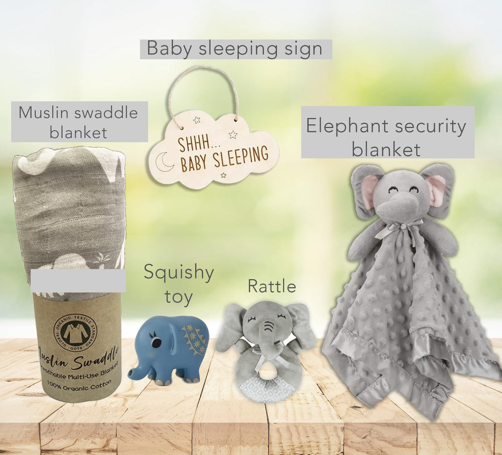 Beyond The Box elephant swaddle muslin blanket image for cozy newborn cuddles and sleep routines.