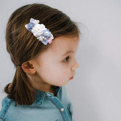 BFNAAgirl alligator clip closeup demonstrating sturdy grip on various hair types.