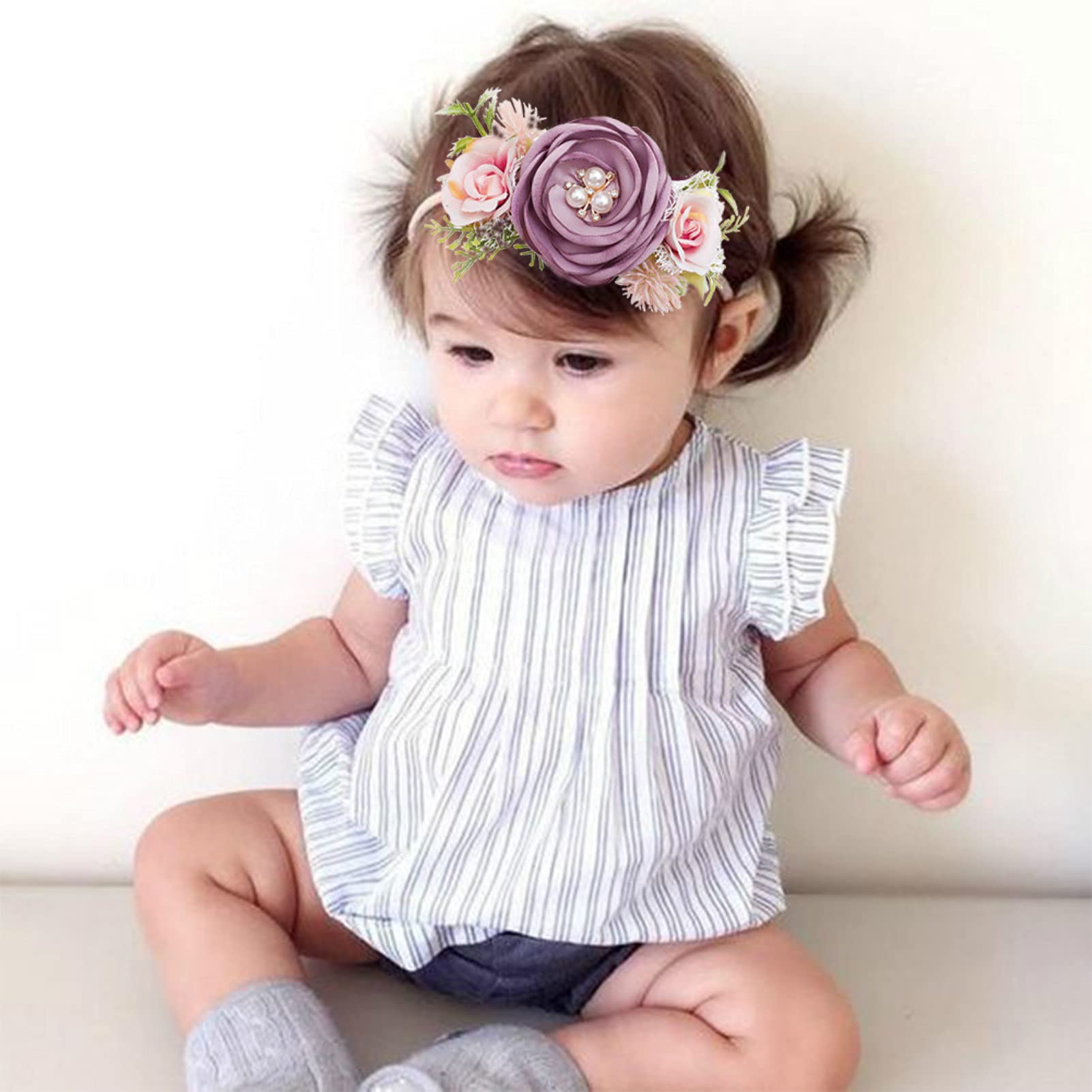 BFNAAgirl elastic nylon band headband demonstrates stretchable fit for toddlers