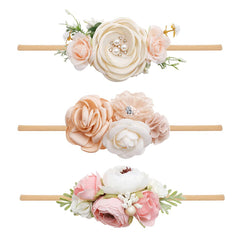 BFNAAgirl baby headbands show soft material with floral accents for gentle wear.