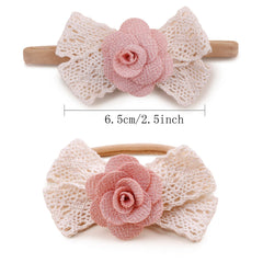 BFNAAgirl close-up of floral details and pearls on headband.