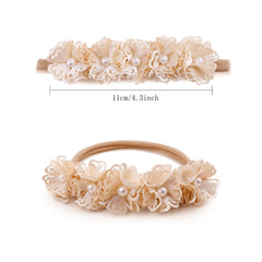 BFNAAgirl floral headband nylon crown 3 demonstrates lightweight stretch band for growing children