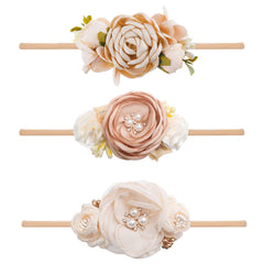 BFNAAgirl floral headband shows soft material for gentle baby comfort.