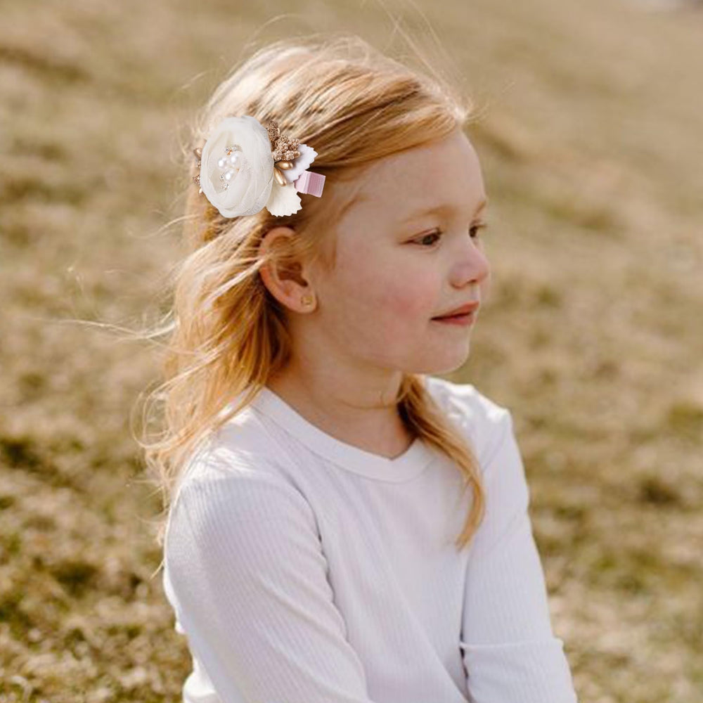 BFNAAgirl flower hair clip with secure alligator clip stays put.