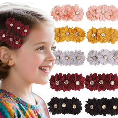 BFNAAgirl flower hair clip closeup showcases delicate petals and secure alligator attachment for everyday wear.