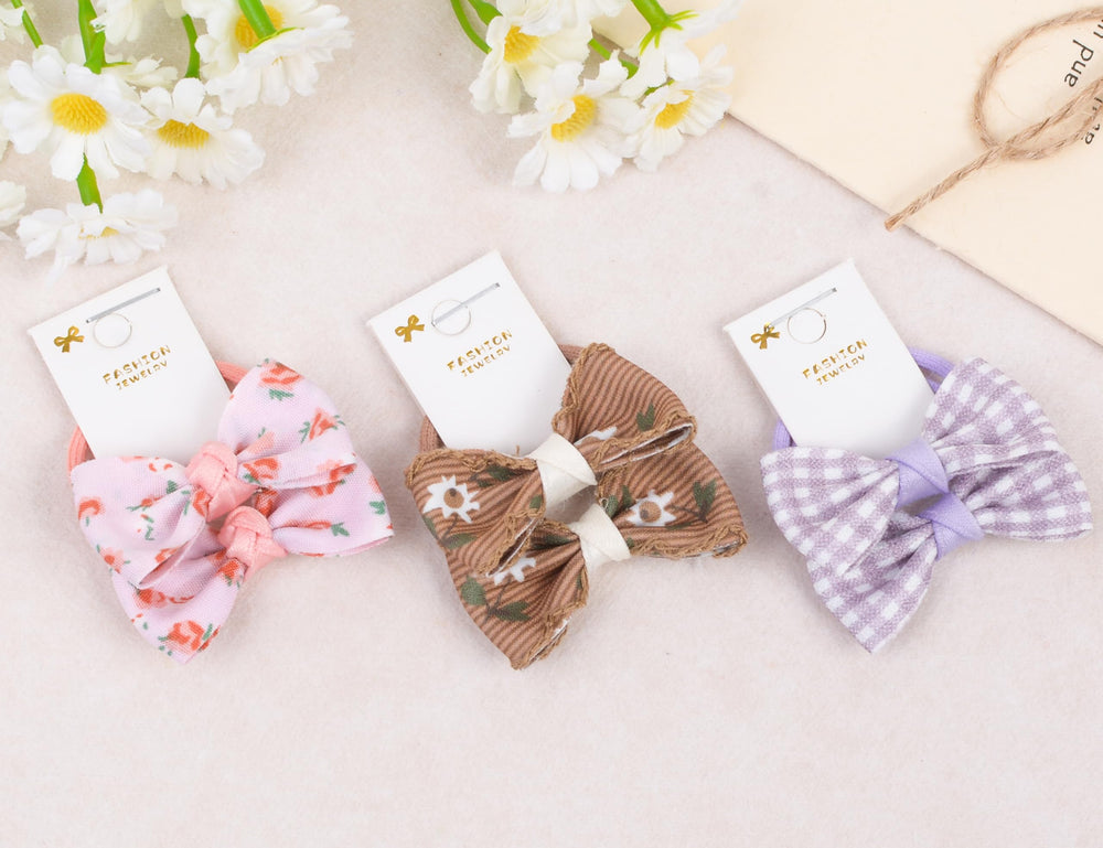 BIANHUAN baby girls hair accessories bows on elastic bands for gentle hair management.