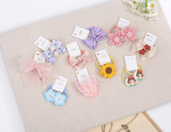 BIANHUAN baby hair ties close-up showing colorful bows and soft elastic