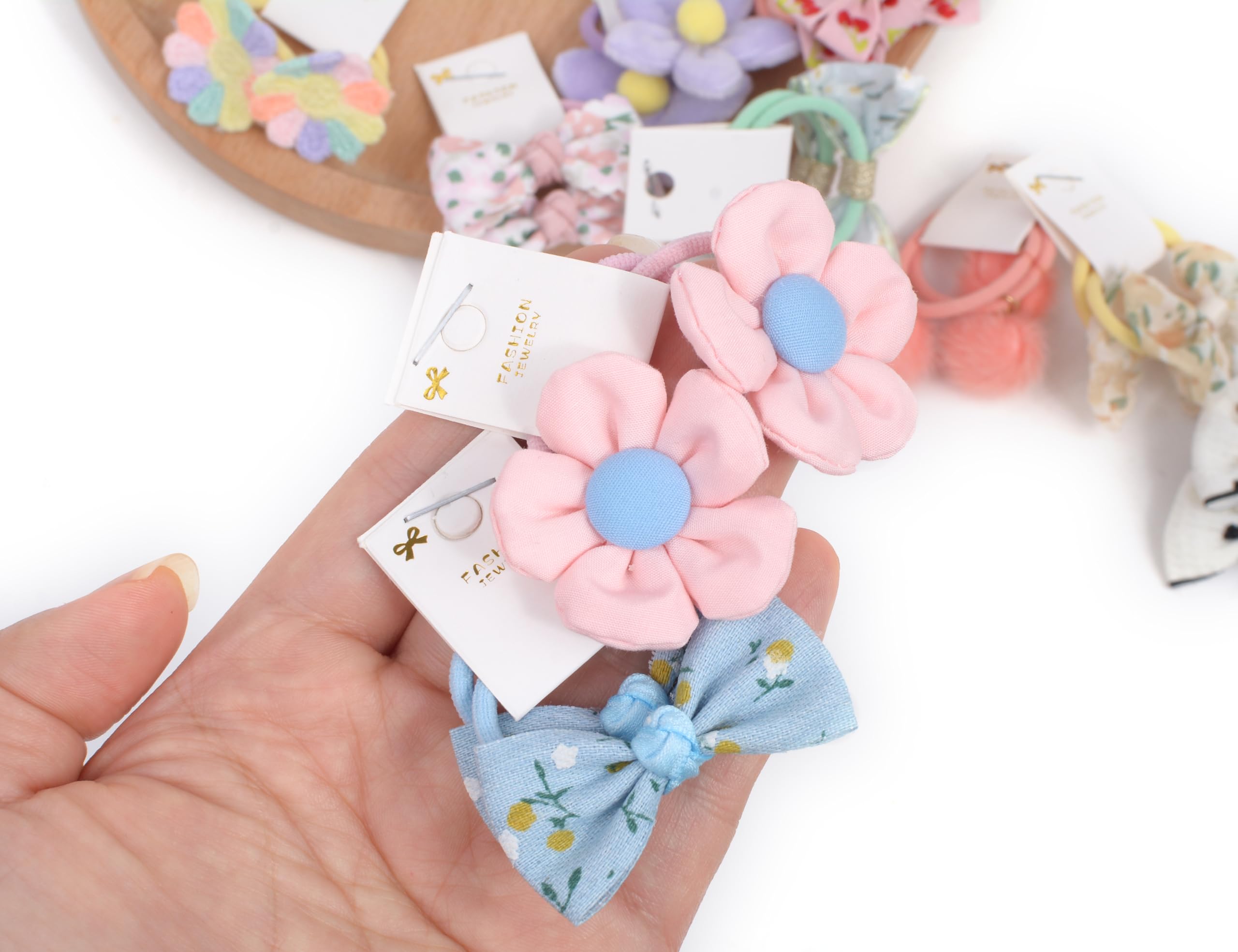 BIANHUAN hair ties with bows worn on baby ponytail showing gentle hold