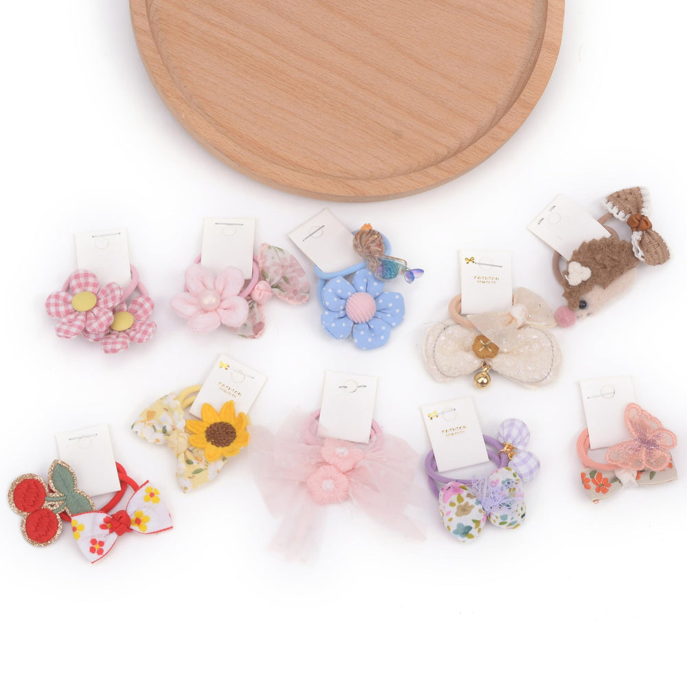BIANHUAN hair ties with bows set-F worn by child demonstrates quick, tidy everyday styling.
