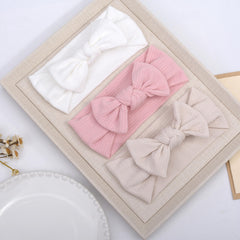 BIANHUAN nylon headband gentle wear closeup emphasizes skin-friendly fabric softness.