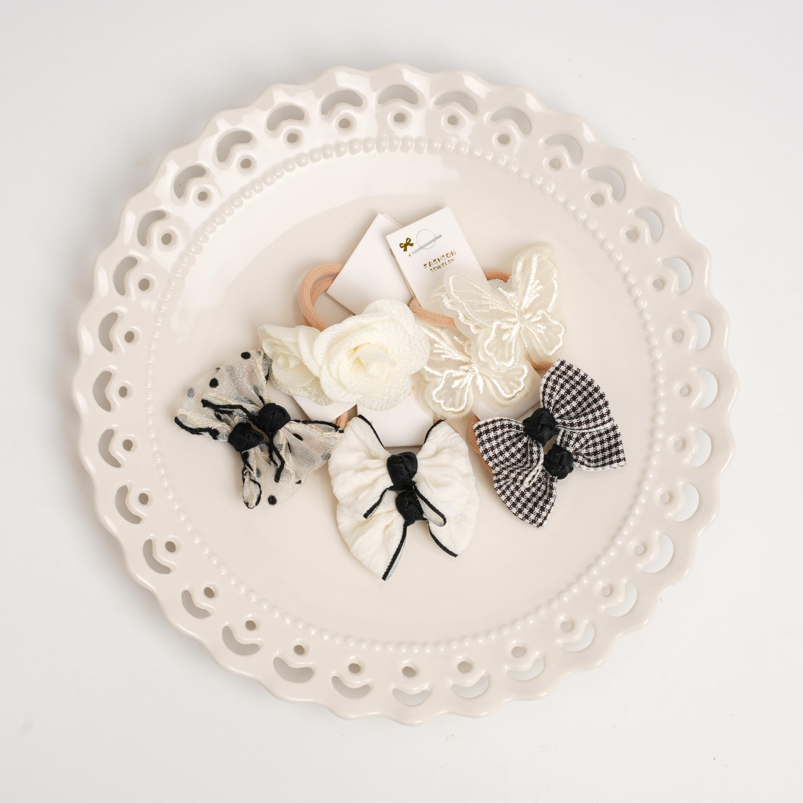 BIANHUAN toddler hair ties close-up—micro bows with soft textures for gentle styling.