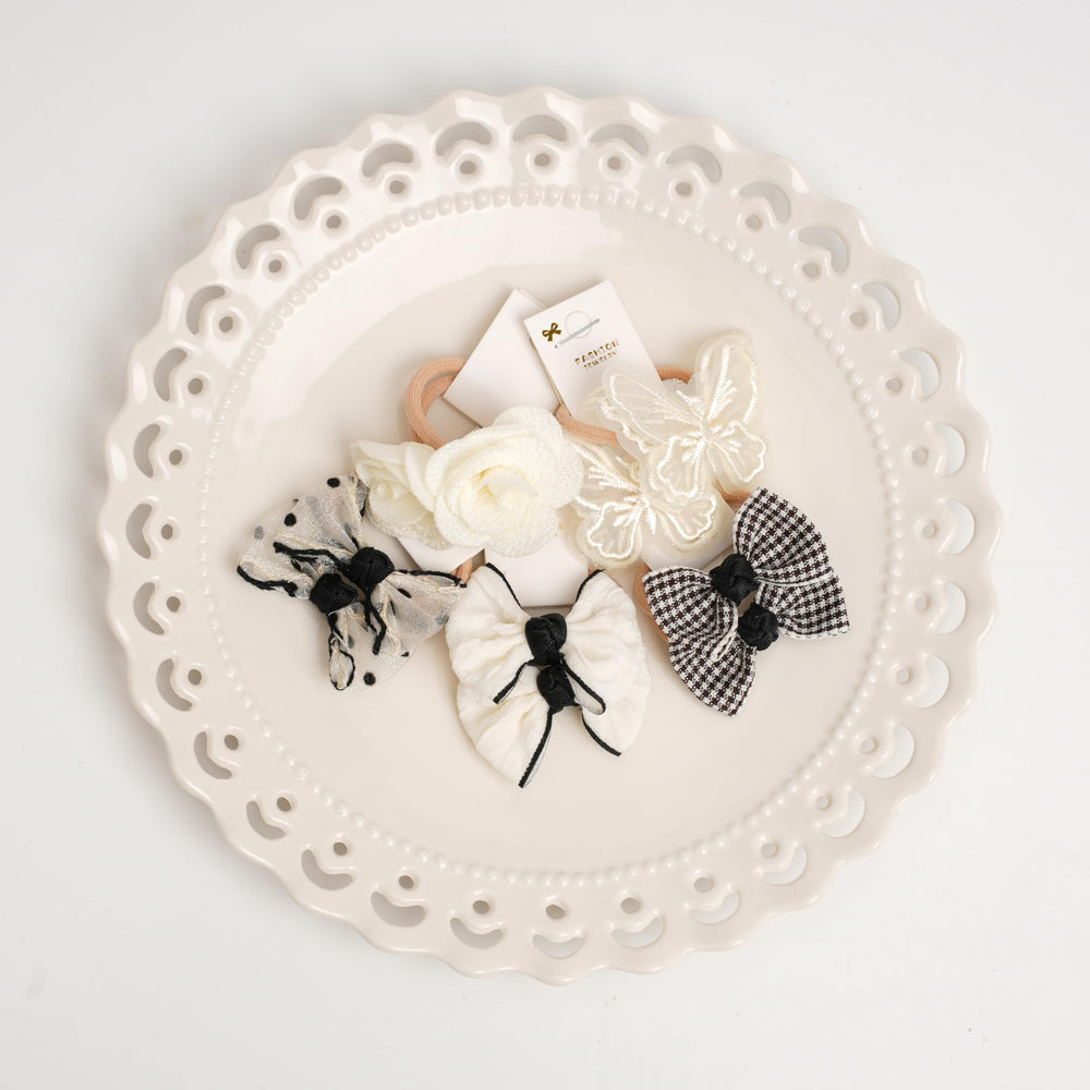 BIANHUAN toddler hair ties close-up—micro bows with soft textures for gentle styling.