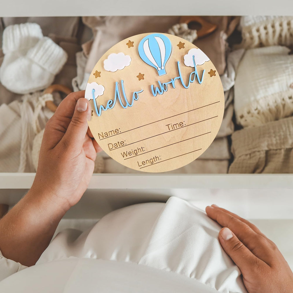 BIANSIWU Hello World sign displayed as a photo prop in the nursery.