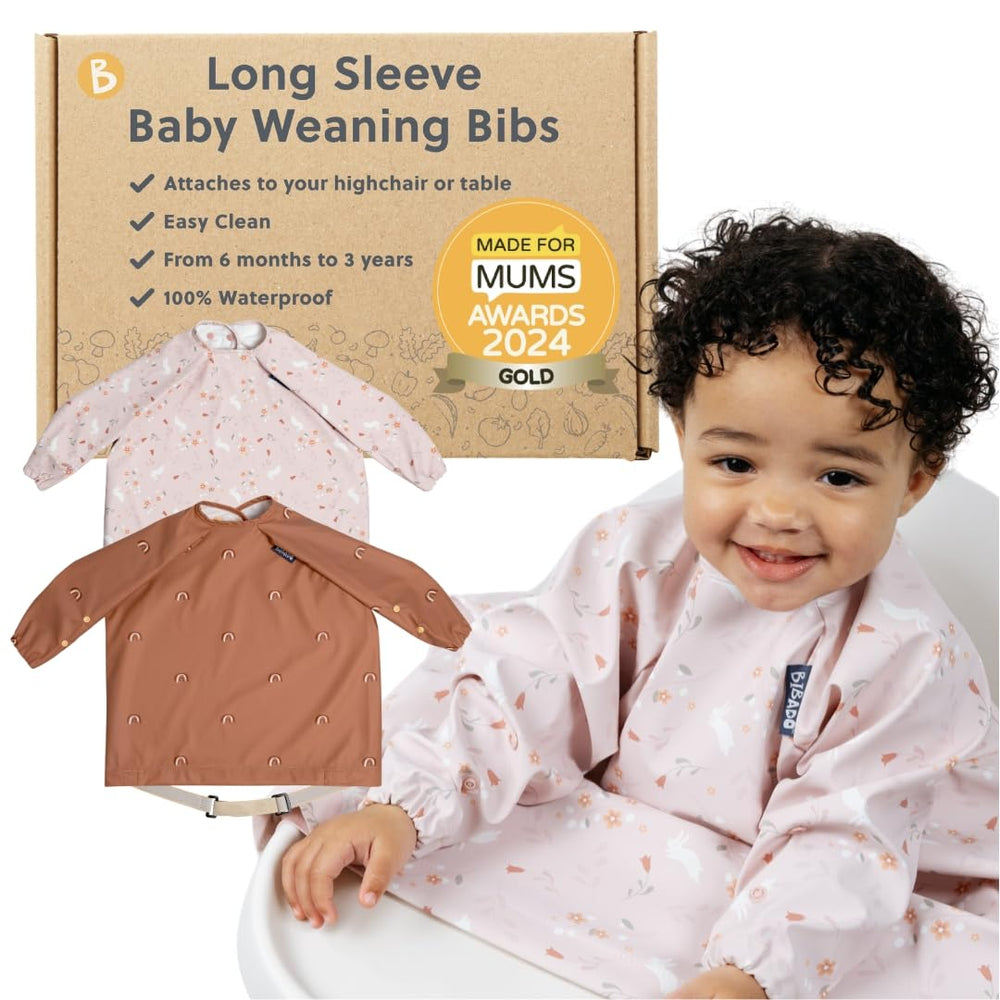 BIBaDO coverall bib on baby during mealtime keeps clothes clean and comfy.