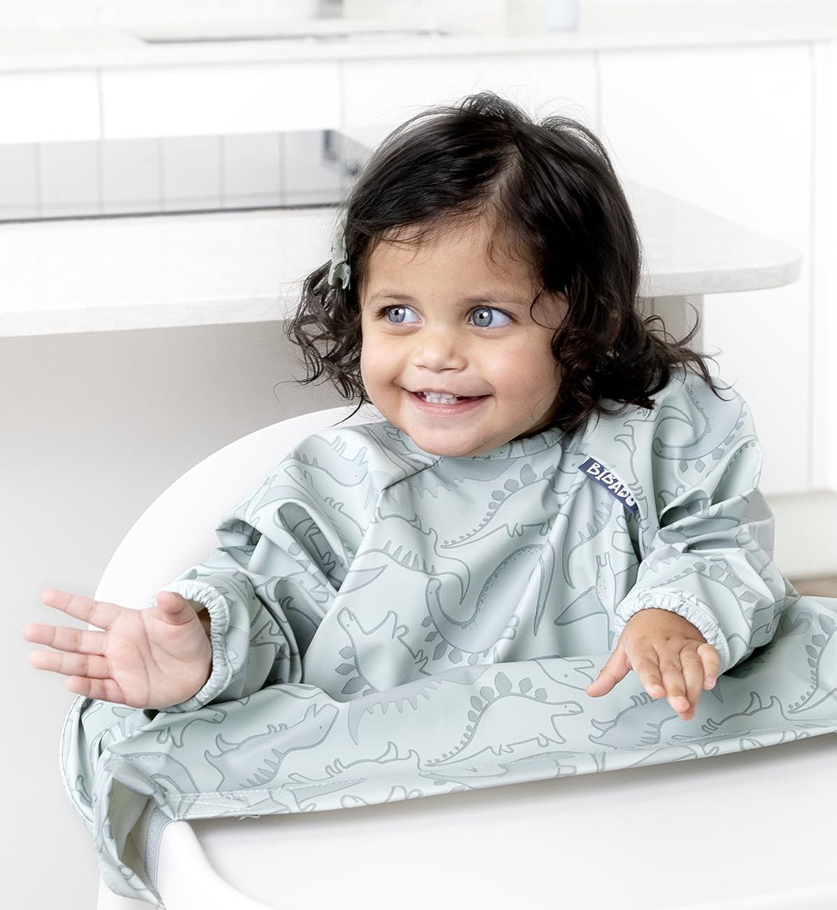 BIBaDO long sleeve bib fits a wide highchair tray for mess-free feeding.