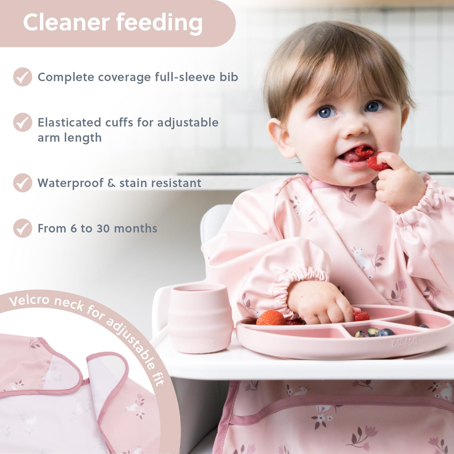 Bibado long-sleeve bib worn on a child at a highchair for full coverage