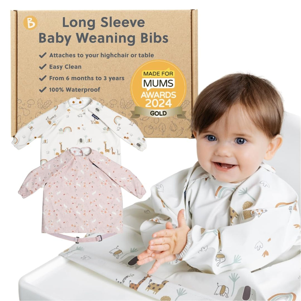 BIBaDO long-sleeve bib on child during meal, promoting mess-free feeding.