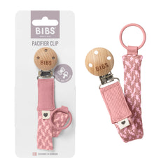 BIBS Paci Braid Dummy Chain in dusty pink keeps pacifiers handy during outings.