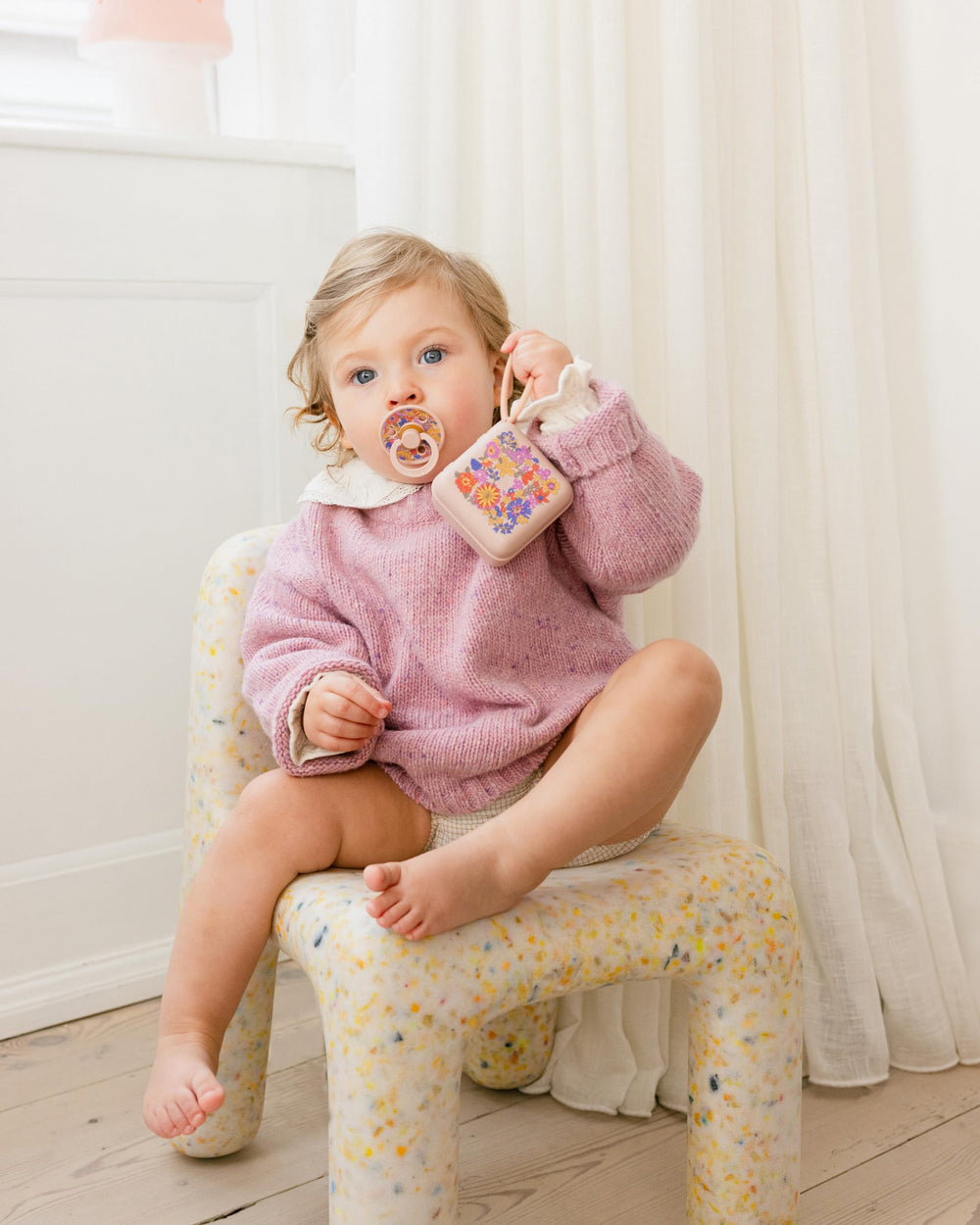 BIBS Liberty baby-use closeup demonstrates calming pacifier in routine daily care.