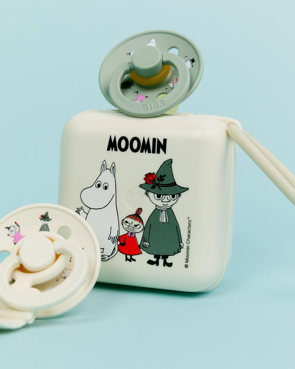BIBS Moomins pacifier box insert holding a single pacifier for organization
