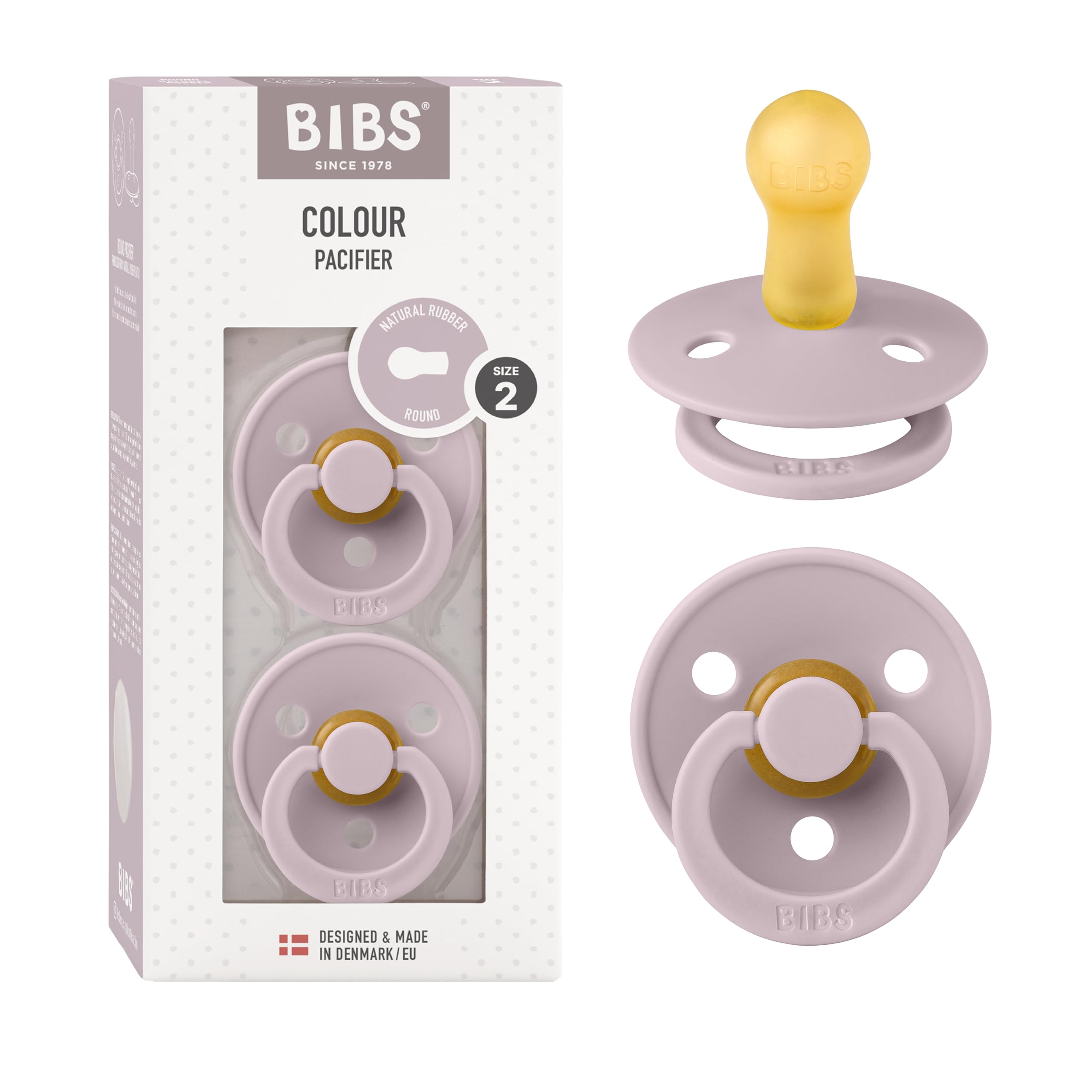 BIBS pacifiers Dusky Lilac two-pack resting on soft blanket for soothing