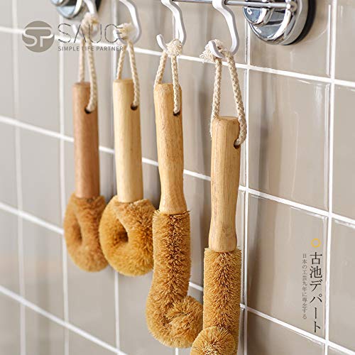 BIEAEIA coconut-fiber brush head delivers gentle scrubbing on pots.