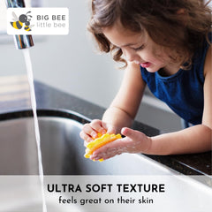 Big Bee, Little Bee lime bath time scene with kid using scrubber.