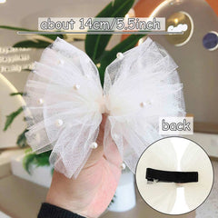 BIKCZEWIN pearl bows worn on child for secure daily wear