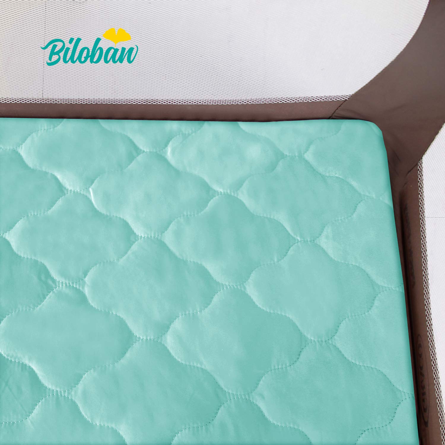 Biloban 39x27 fit with elastic skirt ensures snug playard mattress compatibility.