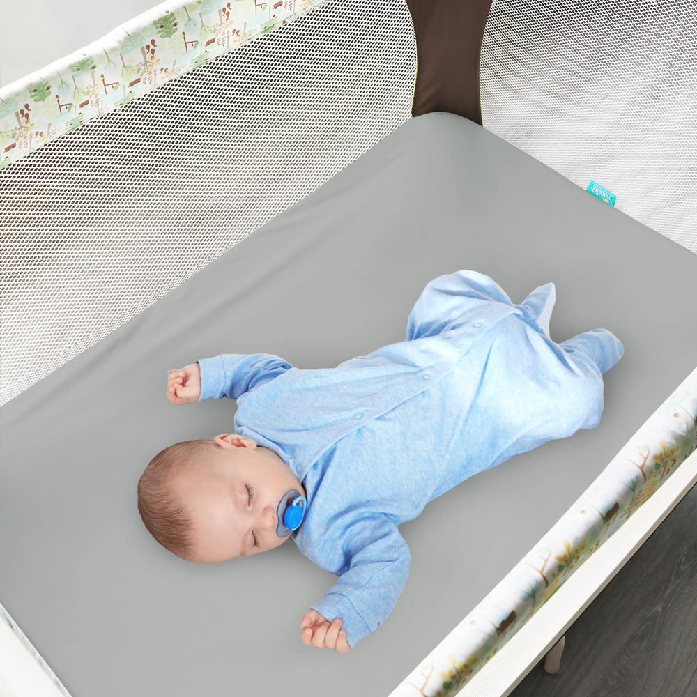 Biloban 4-pack soft microfiber pack and play sheets close-up showing gentle texture.