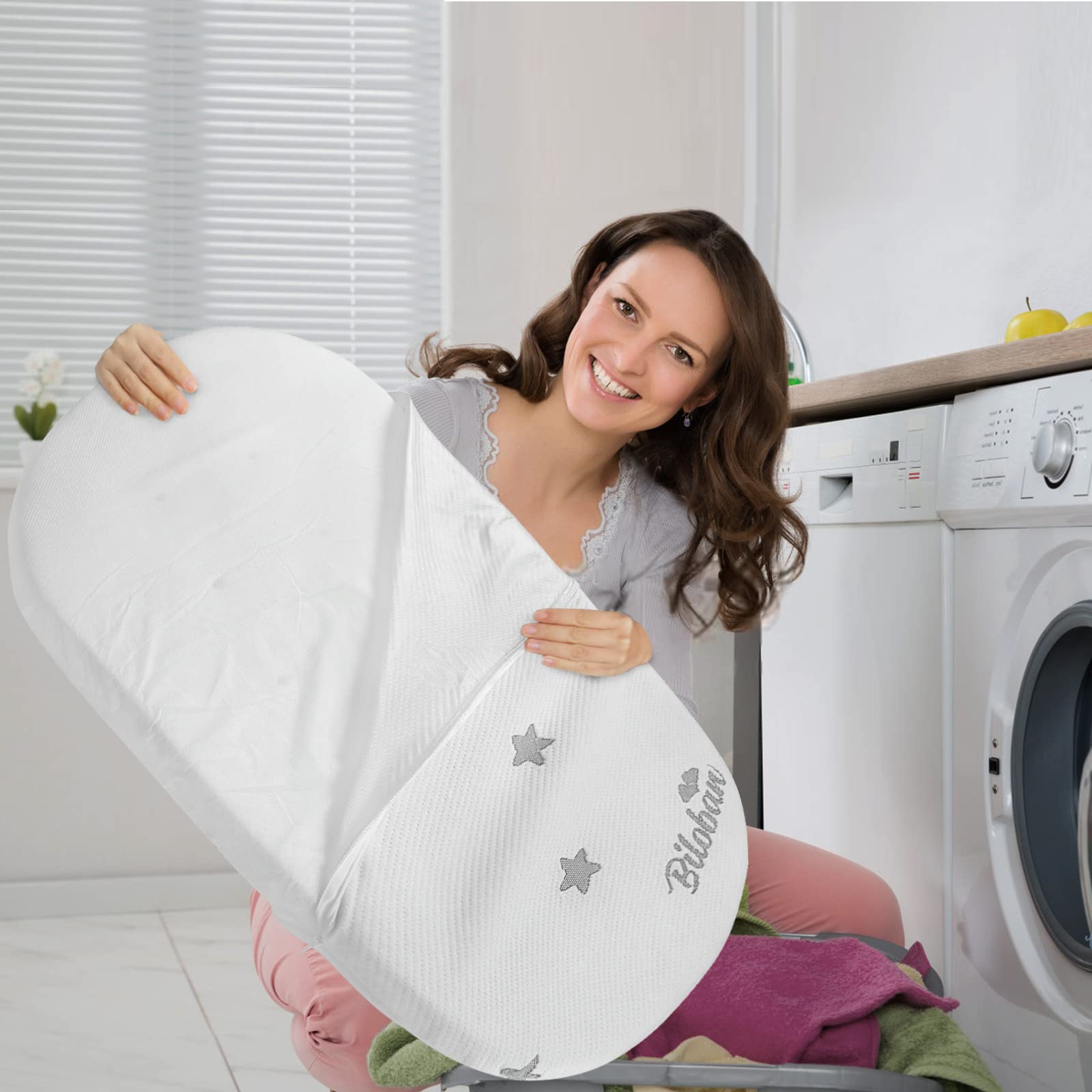 Biloban bassinet mattress pad washable cover emphasizes durable, repeat-clean convenience