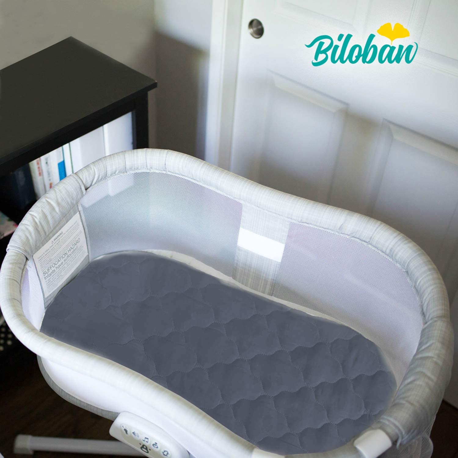 Biloban bassinet pad white-grey colorway presents clean, modern nursery look