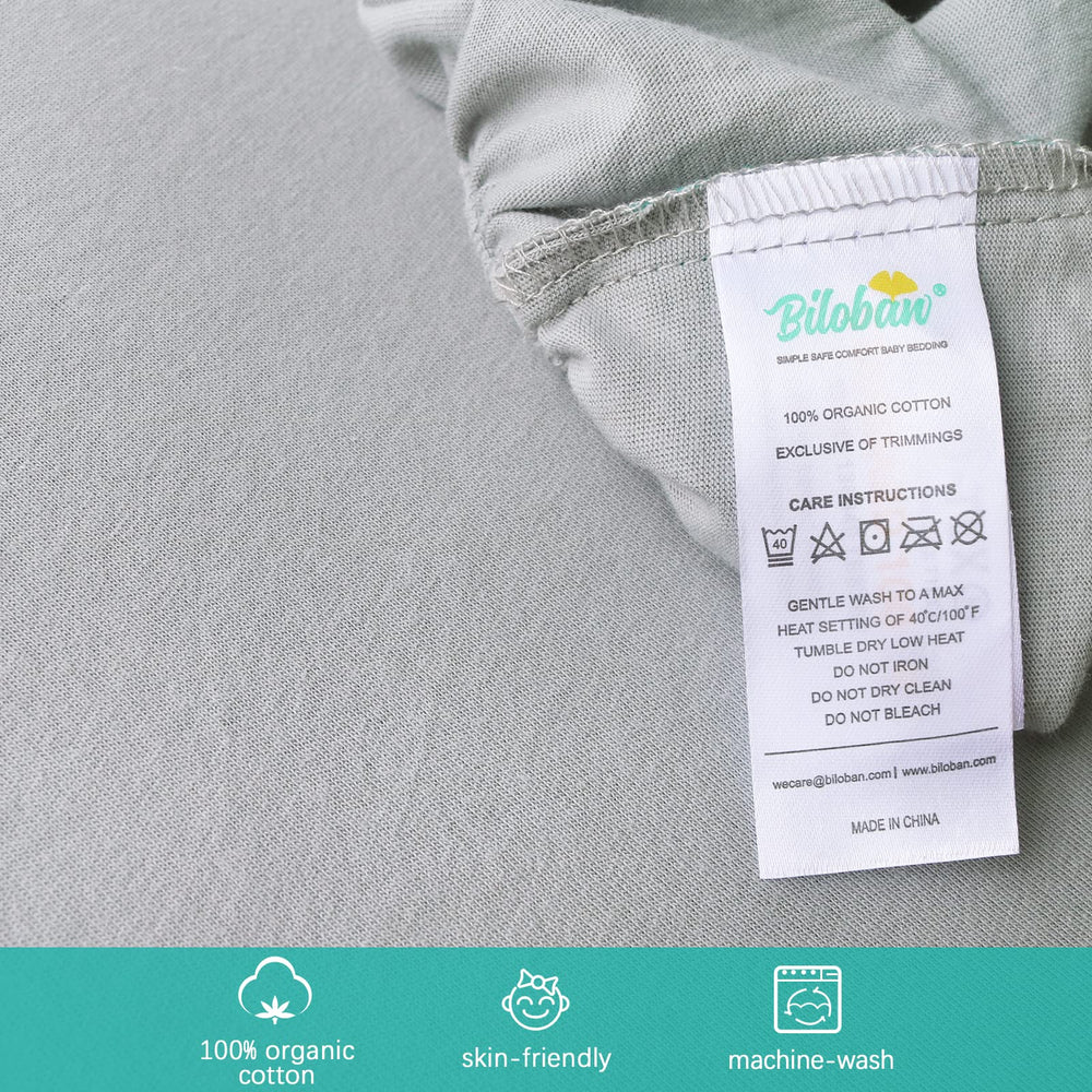 Biloban bassinet sheets close-up highlights breathable cotton and gentle touch.