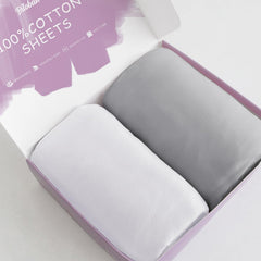 Biloban bassinet sheets 2-pack folded shows soft 100% cotton comfort.