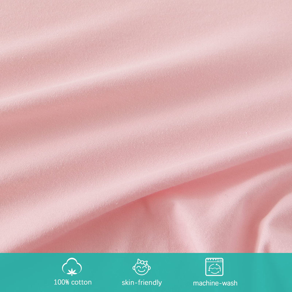 Biloban bassinet sheets with encased elastic edge keep the sheet securely in place