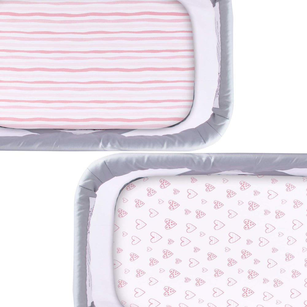 Pink hearts print Biloban bassinet sheet adds cute charm with skin-friendly softness.