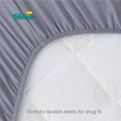 Biloban bassinet sheets rectangle-fit demonstrates snug elastic edge for secure bassinet surface
