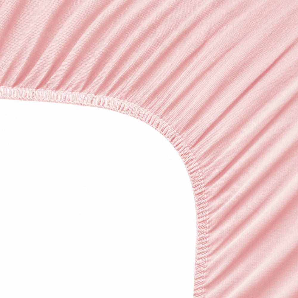 Biloban fitted changing pad cover securely hugs a 32x16 contoured pad